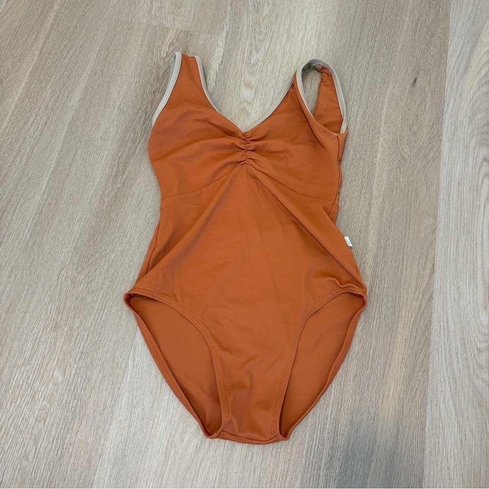 Class In Rust Orange Leotard NWOT